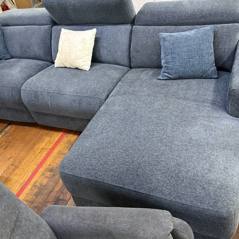 Blue fabric sectional on the store floor