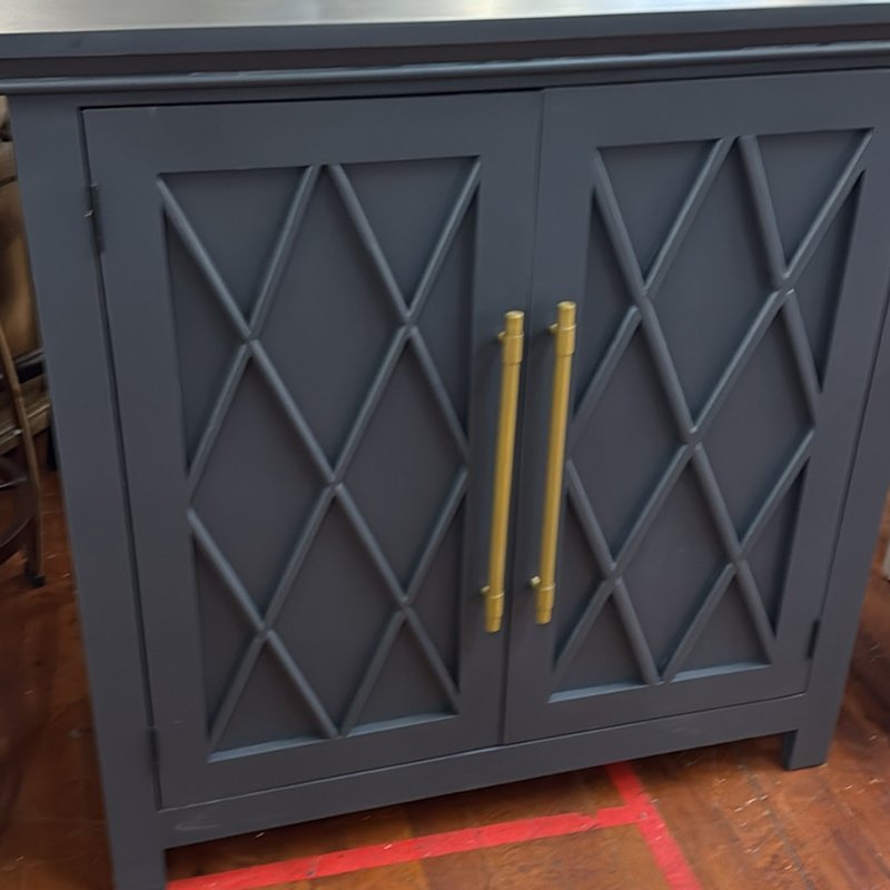 Navy lattice cabinet with gold handles